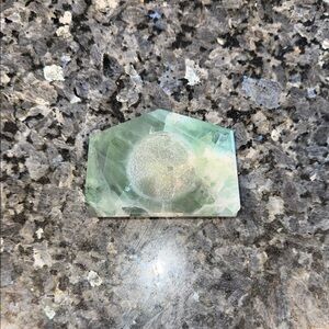 Fluorite feathered sphere holder